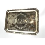 Edwardian silver rectangular dressing table tray embossed with angels heads and foliage 32cm x 23cm
