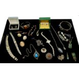 Collection of silver stone set jewellery including marcasite brooches, amber bangle, bracelet and br