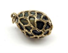 9ct gold tigers eye egg pendant, openwork design