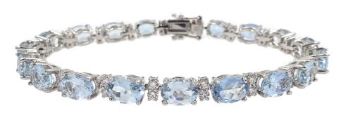 18ct white gold oval aquamarine and diamond bracelet, hallmarked, total aquamarine weight 12.00 cara