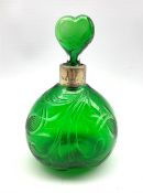 Late Victorian green glass scent flask with incised decoration, silver collar and heart shape stoppe