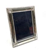 Silver table photograph frame with bead and shell border by Carr's of Sheffield, 2000 H22cm