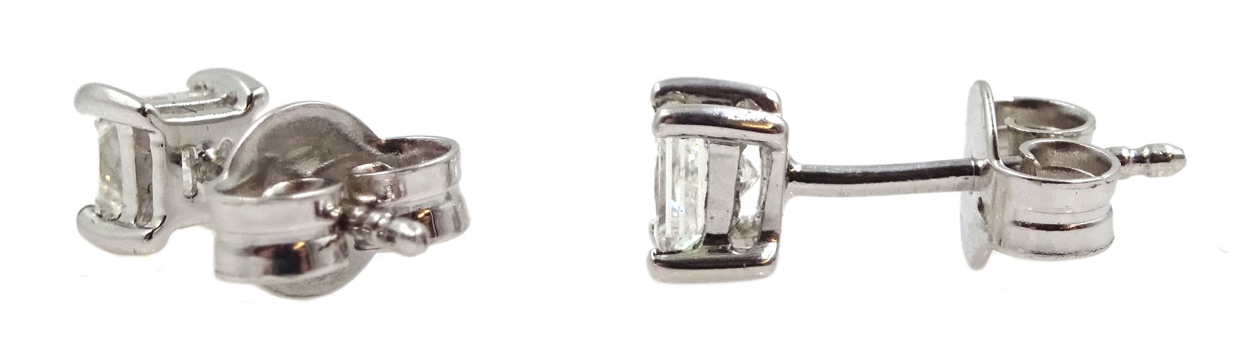 Pair of 18ct white gold princess cut diamond stud earrings, stamped 750, total diamond weight approx - Image 2 of 3