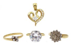 Three gold cubic zirconia rings and a gold cubic zirconia heart pendant, all hallmarked 9ct