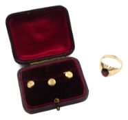 Gold garnet signet ring stamped 9ct and three Victorian gold shirt studs, Birmingham 1898, in silk a