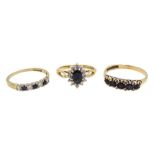 Gold sapphire and diamond cluster ring, gold sapphire and cubic zirconia ring and a five stone sapph