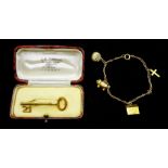 9ct gold 21 key brooch, Chester 1951, retailed by A.E. Hopper York, boxed and a gold bracelet with g