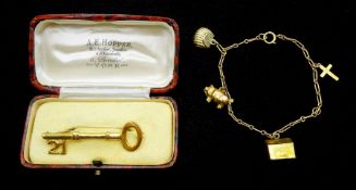 9ct gold 21 key brooch, Chester 1951, retailed by A.E. Hopper York, boxed and a gold bracelet with g
