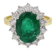 18ct gold oval emerald and diamond cluster ring, hallmarked, emerald 3.00 carat, total diamond weigh