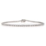 White gold diamond line bracelet, stamped 18K, total diamond weight 2.70 carat