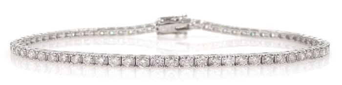 White gold diamond line bracelet, stamped 18K, total diamond weight 2.70 carat