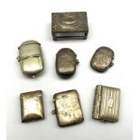 Plated combination vesta and sovereign case, another, four silver vesta cases and a silver match box