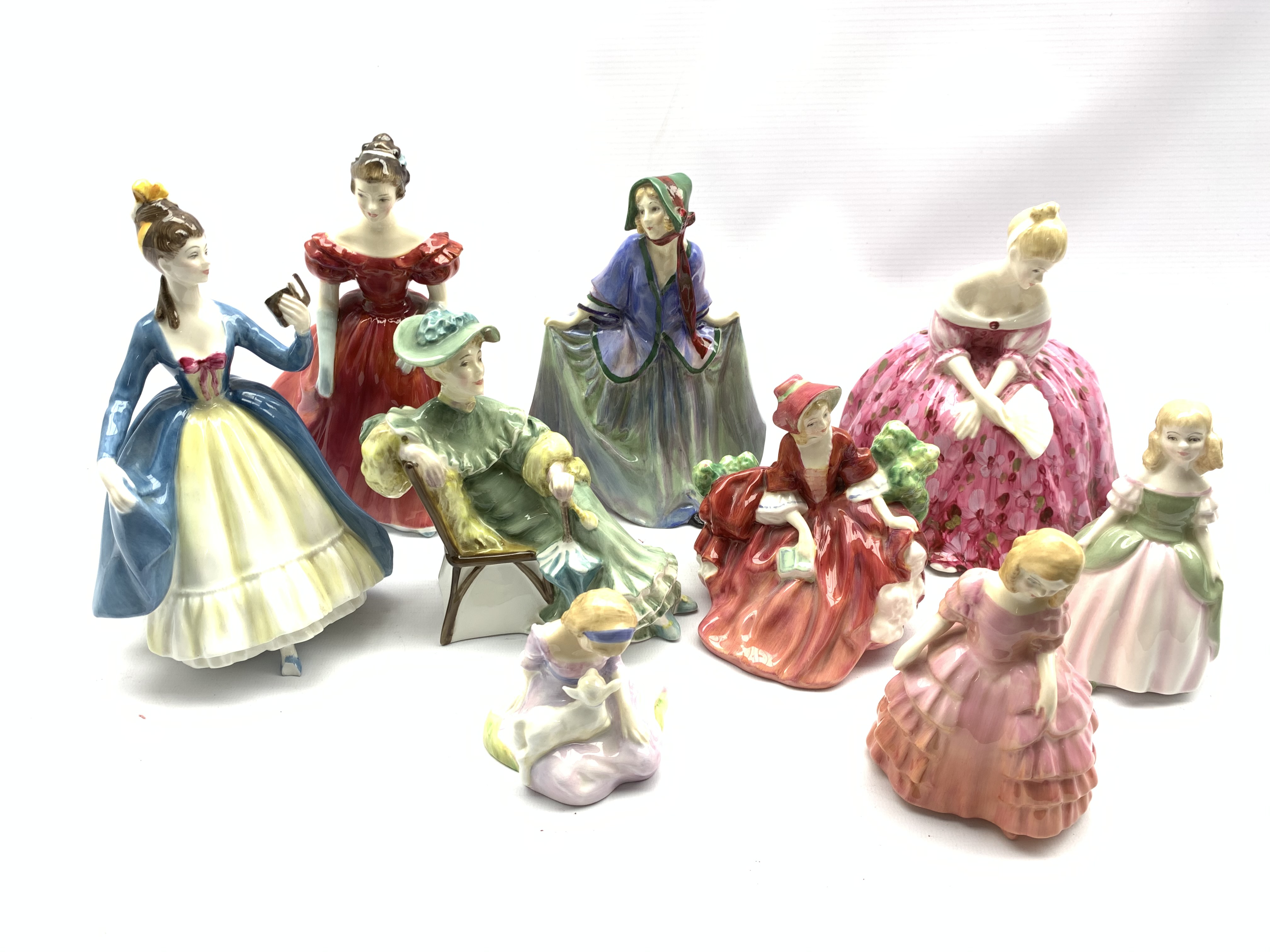 Nine Royal Doulton figures including Winsome, Victoria, Leading Lady, Ascot, Sweet Anne, Penny, Lydi