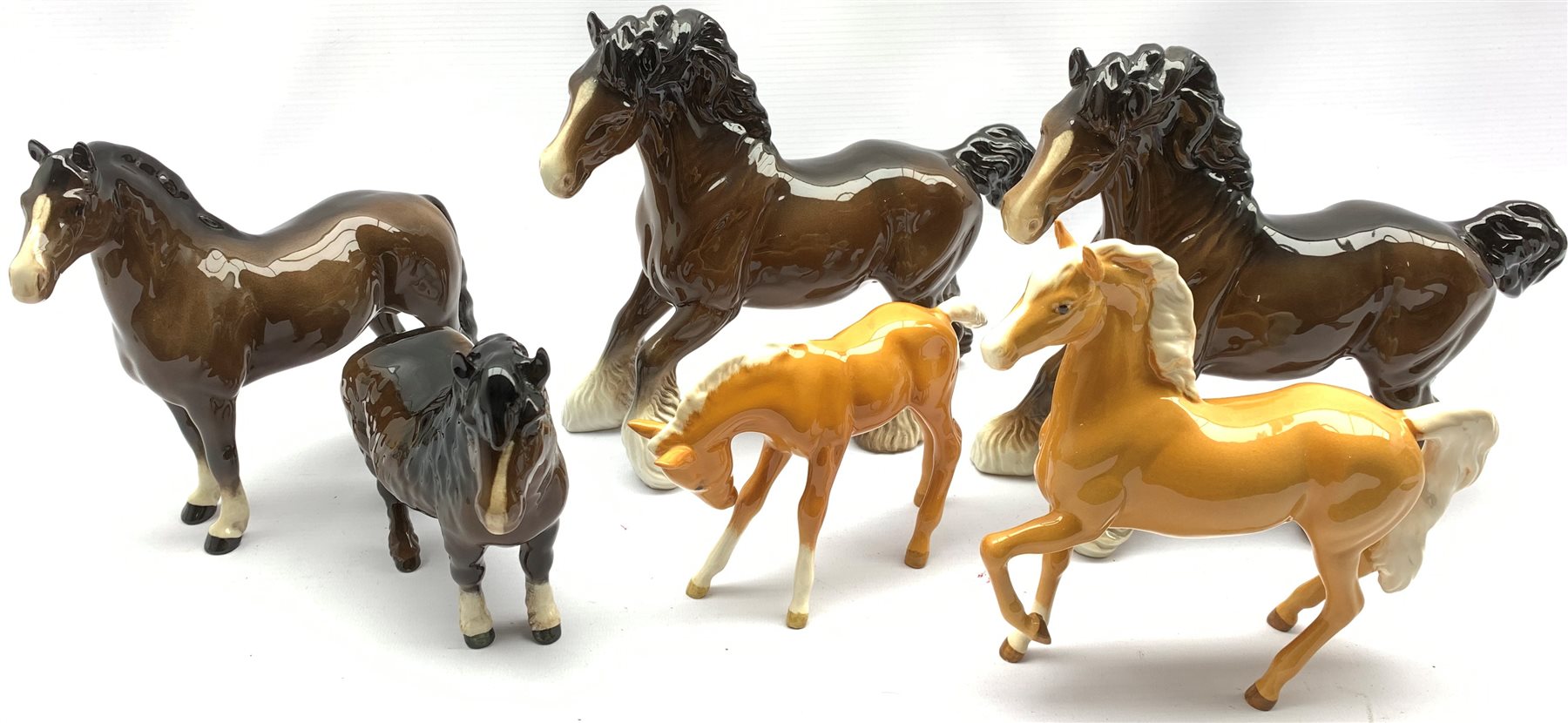 Six Beswick horses and foals including Two Cantering Shires in brown No. 975, Palomino foal No.947, - Image 2 of 2