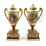 Pair of 'Vienna' two handled baluster vases with covers and stands decorated with classical figures
