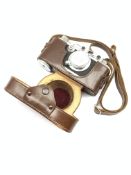 Leica IIIa camera body with 'Leitz Elmar f=5cm 1:3,5' lens, housed in a Leica case, with a Leica Gui