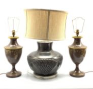 Pair of urn form table lamps together with a large modern table lamp with textured design and brown