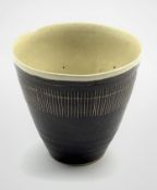 Dame Lucie Rie D.B.E (1902-1995) a stoneware beaker decorated to the exterior with sgraffito lines i