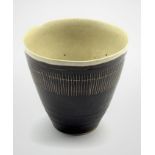 Dame Lucie Rie D.B.E (1902-1995) a stoneware beaker decorated to the exterior with sgraffito lines i