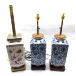 Pair of Oriental blue and white square section lamps on hardwood stands, H57cm and another similar l