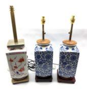 Pair of Oriental blue and white square section lamps on hardwood stands, H57cm and another similar l