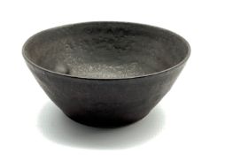 Dame Lucie Rie DBE (1902-1995) a small stoneware bowl with manganese glaze, impressed seal mark D8.5