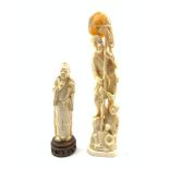 Japanese Meiji ivory Okimono of a Fisherman and young boy, H35.5cm together with a similar age Japan