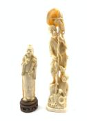 Japanese Meiji ivory Okimono of a Fisherman and young boy, H35.5cm together with a similar age Japan