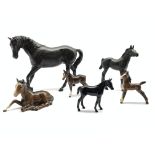 Beswick model of Black Beauty No. 2466, Black Beauty foal No. 2536, black gloss foal No. 1817 and t