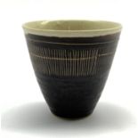 Dame Lucie Rie D.B.E (1902-1995) a stoneware beaker decorated to the exterior with sgraffito lines i