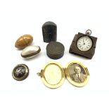 Small collectible items including coquille nut cotton reel holder, Swiss fob watch with silver case
