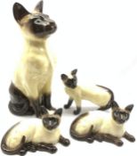 Beswick Fireside model of a Siamese cat No. 2139, pair of Siamese cats No. 1559 second version and a