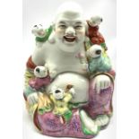 20th century Chinese porcelain figure of Hotei seated with five children, H21cm