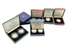 Seven United Kingdom silver proof coins/sets including two 1986 two pound coins, 1990 five pence two