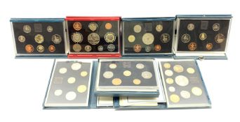 Seven United Kingdom proof coin sets dated 1985, 1987, 1988, 1993, 1995, 1997 and 2001