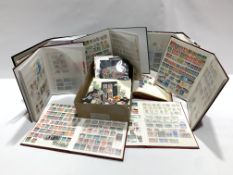 Great British and World stamps in eight albums/folders and loose including Australia, Canada, Ceylon