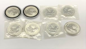 Eight one ounce fine silver Britannia coins, five dated 1998 and three 1999