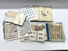 World stamps in various albums including small number of Chinese stamps, Japan Singapore, Canada, Ge