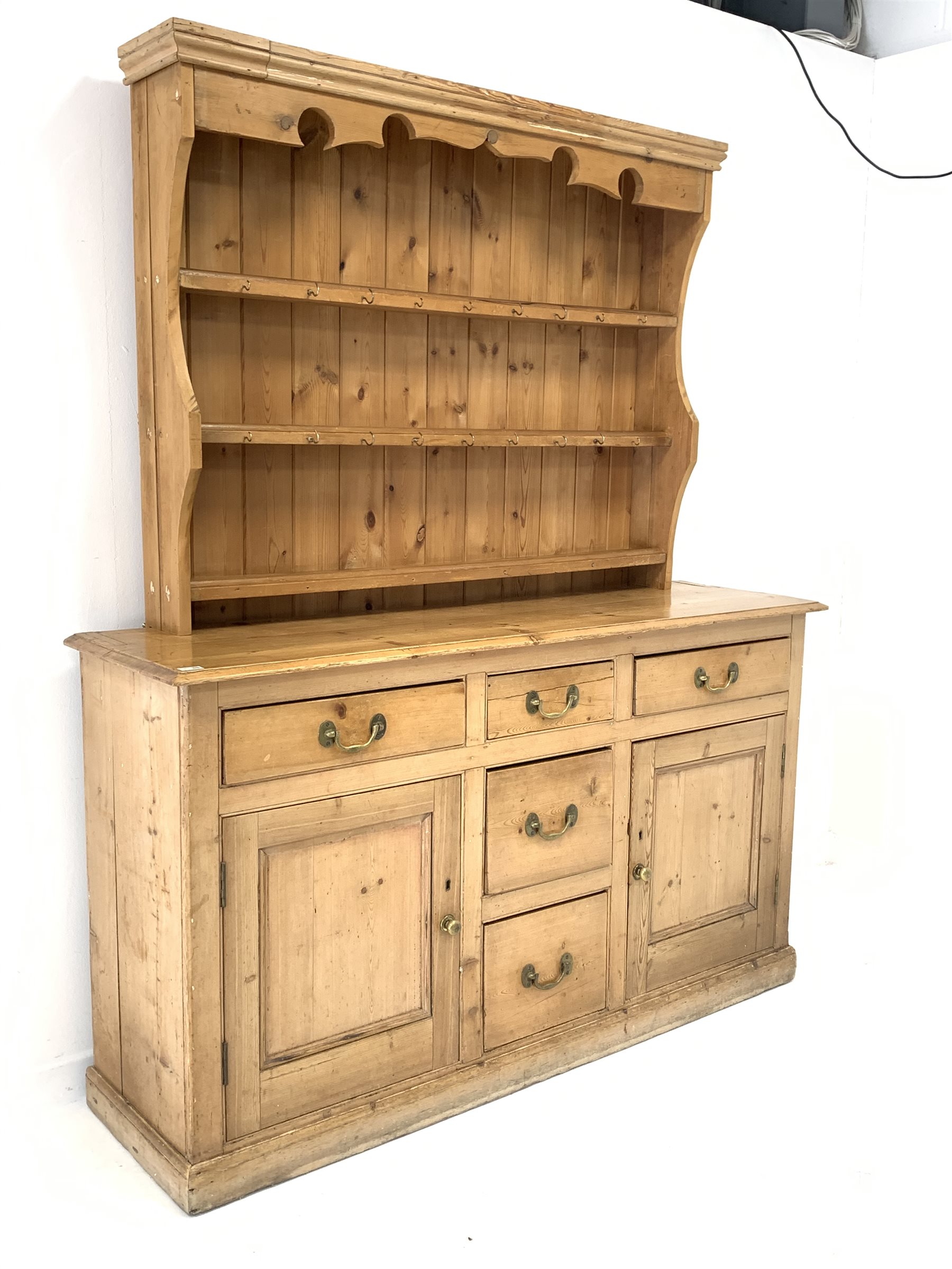 Late 19th century waxed pine dresser base, with five drawers and two panelled cupboards enclosing s - Image 6 of 6