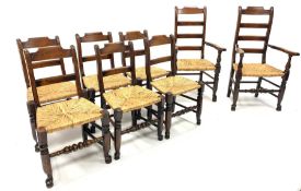 Set eight (6+2) oak rail back country chairs, with rush seats raised on turned front supports unite