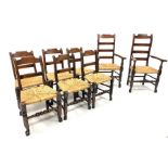 Set eight (6+2) oak rail back country chairs, with rush seats raised on turned front supports unite