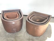 Two sets of three D shaped salt glazed terracotta planters, W51cm