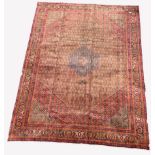 Persian Bijar ground carpet, lozenge medallion on red field surrounded by all over stylised floral