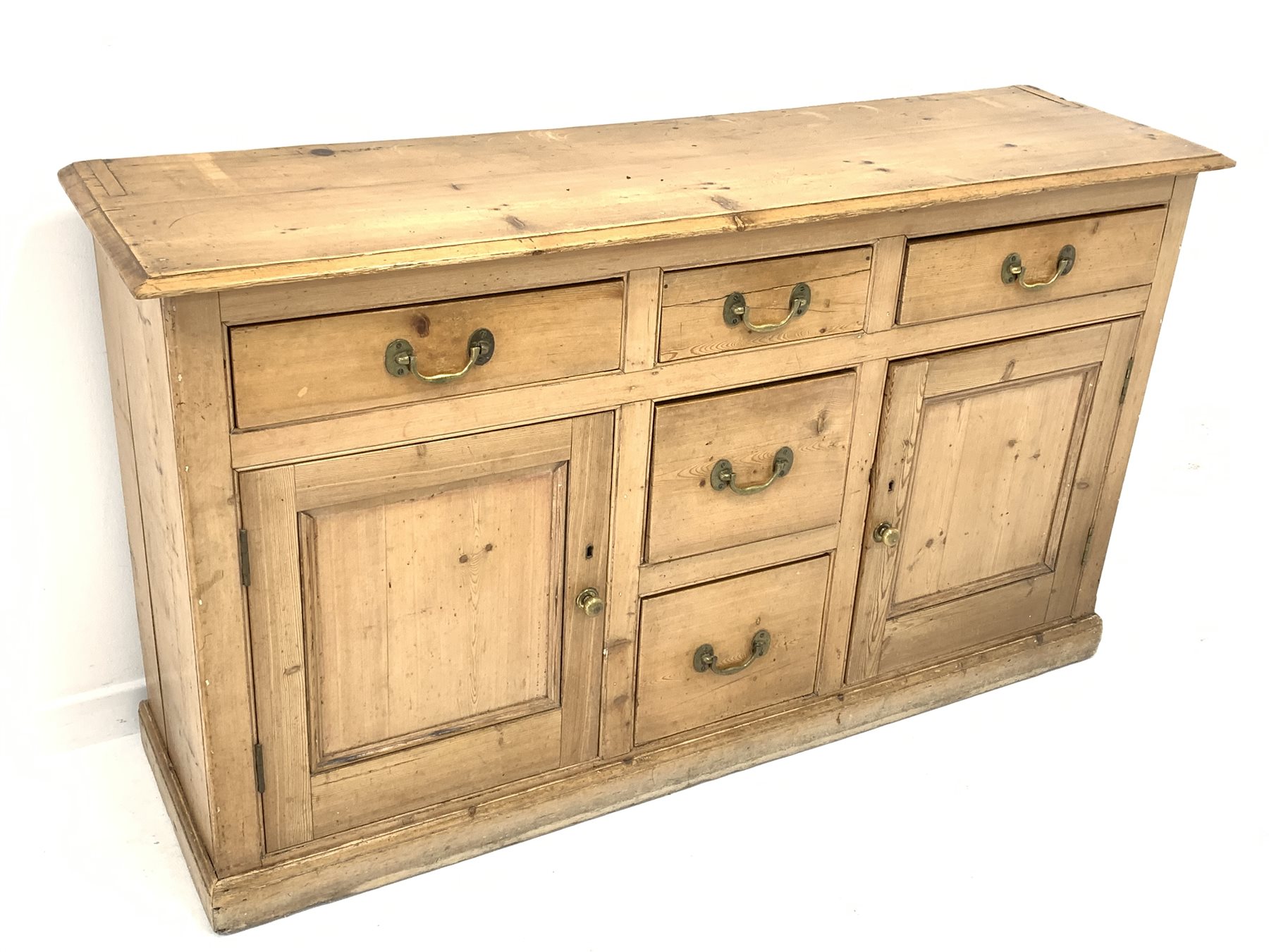 Late 19th century waxed pine dresser base, with five drawers and two panelled cupboards enclosing s - Image 2 of 6