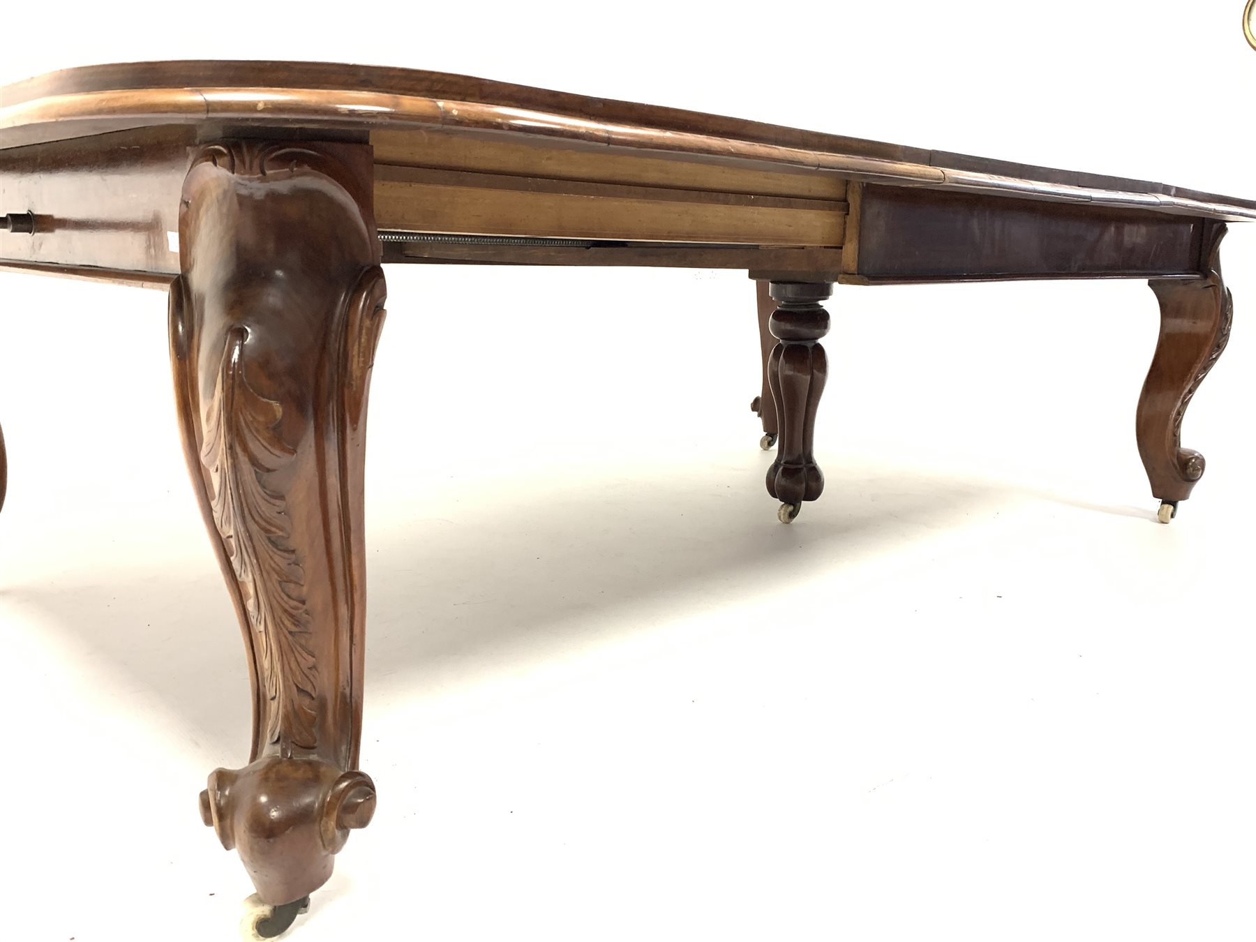 Large Victorian walnut extending dining table, the moulded top with 'D' shaped ends raised on leaf - Image 2 of 7