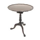Georgian mahogany occasional table circular top with pie crust edge and bird cage bracket raised on