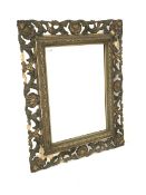 Early 20th century Irish gilt framed wall mirror, with scrolled acanthus leaf and shell motifs to b
