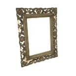 Early 20th century Irish gilt framed wall mirror, with scrolled acanthus leaf and shell motifs to b