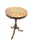 Victorian walnut tripod table with inlaid games board and chequered frieze, raised on turned ash su