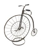 Copy of a Victorian Penny Farthing or high wheeler ordinary bicycle, iron framed, turned fruit wood